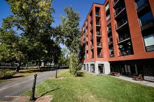 Lachine Canal Park walkway with bike path and scenic waterfront views in Griffintown