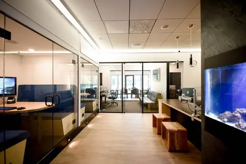 Private closed office for 10 people - executive team suite with conference table and workstations